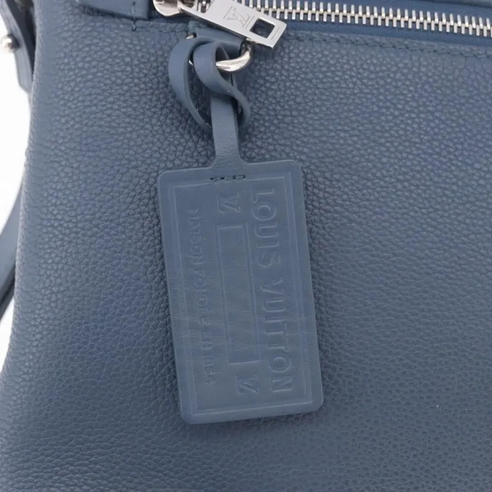 Louis Vuitton Leather Takeoff Pouch Blue